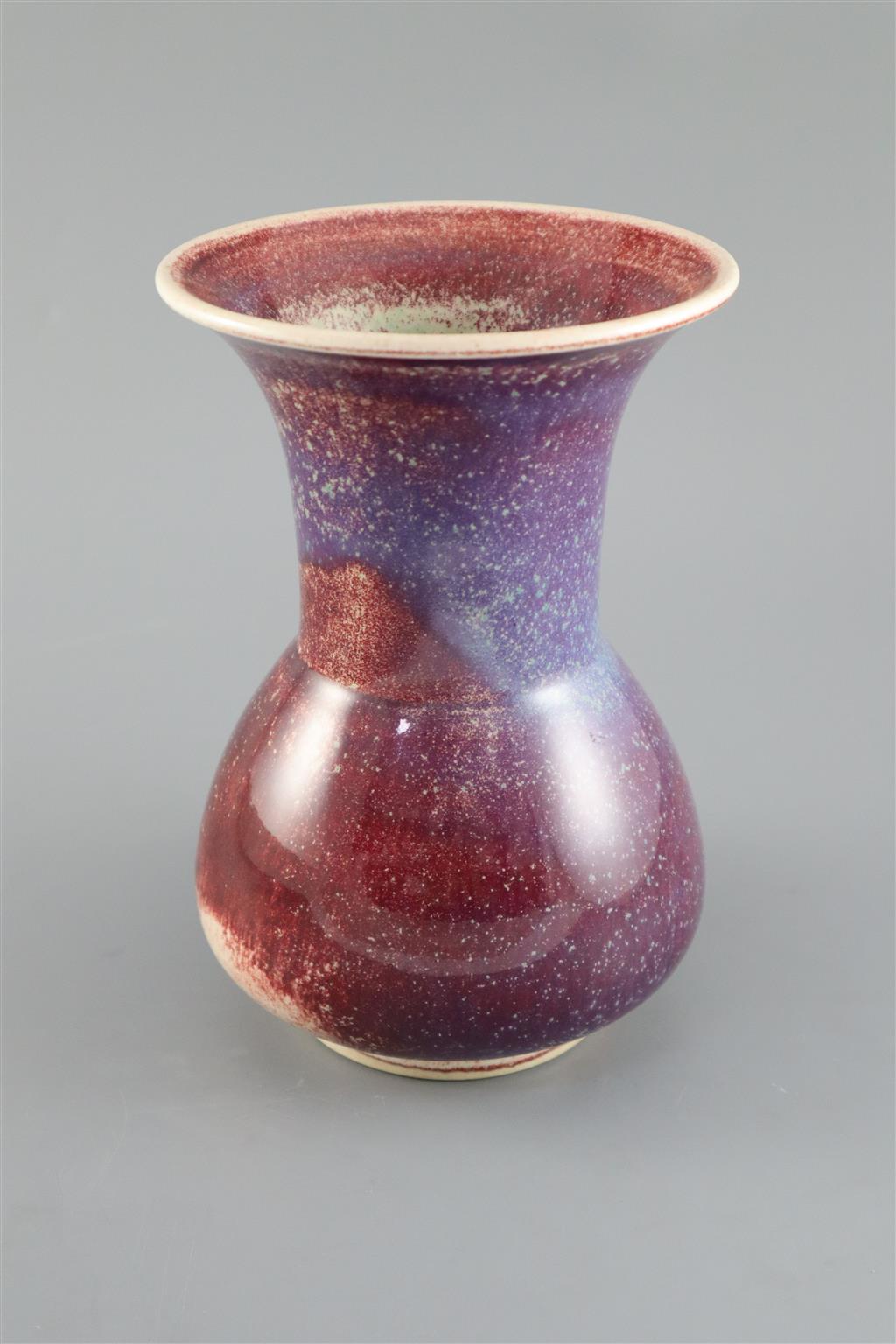 A Ruskin high fired flambe glazed vase, dated 1911, 22cm high